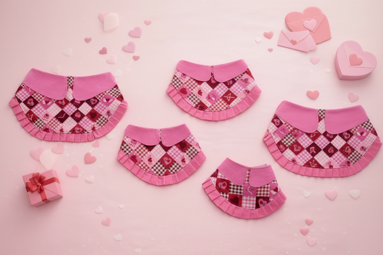 Pink and red checkered pet dresses on a pink background with hearts and gift boxes.